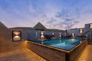 The swimming pool at or close to Beyond Pyramids View