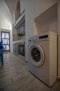 Η κουζίνα ή μικρή κουζίνα στο Vaccarini Home