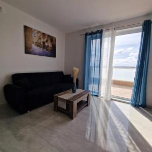 Posezení v ubytování Chaltan Apartment - Raħal Ġdid + 6 fotografií