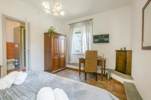 TV a/nebo společenská místnost v ubytování BB Trastevere Station - Room1