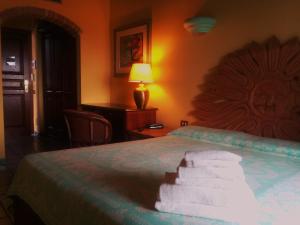 Postel nebo postele na pokoji v ubytování Hotel dell'Ancora