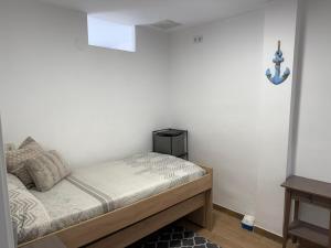 Posteľ alebo postele v izbe v ubytovaní Casa Aigua Blanca Oliva