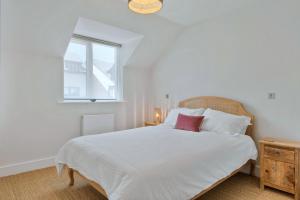 Finest Retreats - Tree View tesisinde bir odada yatak veya yataklar