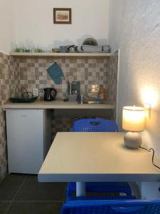 Kuchyň nebo kuchyňský kout v ubytování Mariyka Apartaments 2