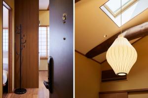 a room with a skylight and a light fixture at Minn Nijo-jo in Kyoto