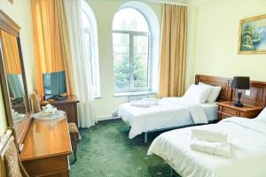 Lalaner Hotel房間的床