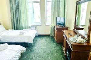 Lalaner Hotel房間的床