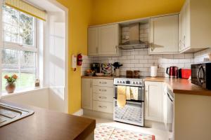 Η κουζίνα ή μικρή κουζίνα στο Duffus House Lodge +8 φωτογραφίες