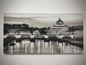 a black and white photo of a bridge over a river at Casa Vacanze Tellus in Ciampino