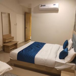 Cama o camas de una habitación en Hotel Krishna Park