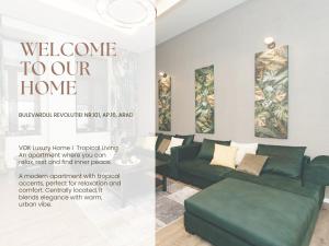 a advertisement for a living room with a green couch at VOK Luxury Home I Tropical Living in Arad +74 photos