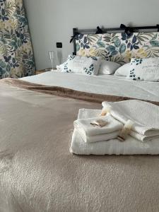 Postel nebo postele na pokoji v ubytování La Corte Guesthouse