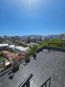 a balcony with a view of a city at Departamento 12 Tower in Salta
