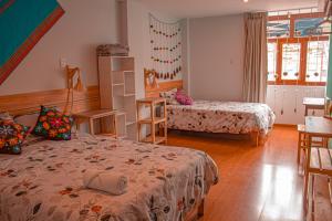 Postel nebo postele na pokoji v ubytování habitación y cocina solo para ti