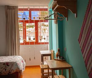 Postel nebo postele na pokoji v ubytování habitación y cocina solo para ti