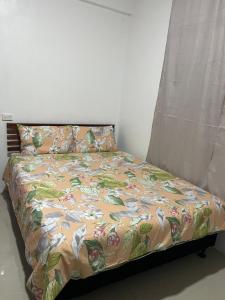 Ένα ή περισσότερα κρεβάτια σε δωμάτιο στο Seaview Heights Apartment +33 φωτογραφίες