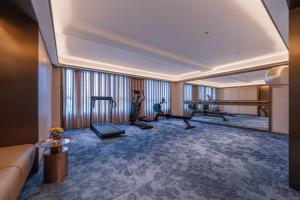 Fitness centrum a/nebo fitness zařízení v ubytování Orange Crystal Hotel Zhizhu Garden East China Normal University Minhang District Shanghai