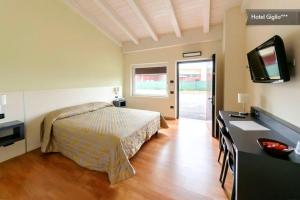 TV a/nebo společenská místnost v ubytování Hotel Motel Giglio