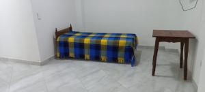 Postel nebo postele na pokoji v ubytování Apartamentos con estacionamiento cerca al parque