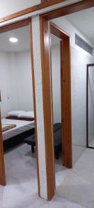 Postel nebo postele na pokoji v ubytování Apartamentos con estacionamiento cerca al parque