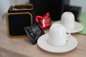 Příslušenství pro přípravu čaje a kávy v ubytování Residenze Miao