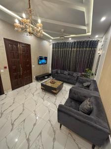 Khu vực ghế ngồi tại Cozy 3BDR Kitchen Lounges DHA phase 9 Lahore