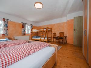 Postel nebo postele na pokoji v ubytování Holiday Home Oberhaslach by Interhome