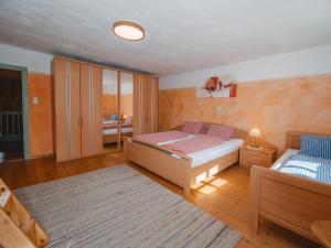 Postel nebo postele na pokoji v ubytování Holiday Home Oberhaslach by Interhome