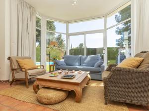 a living room with a couch and a coffee table at Holiday Home Serge by Interhome in Cambrils