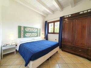 Posteľ alebo postele v izbe v ubytovaní Apartment La Rosa-2 by Interhome