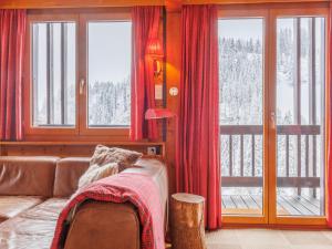 Ένα ή περισσότερα κρεβάτια σε δωμάτιο στο Chalet Le Cyclamen by Interhome +31 φωτογραφίες