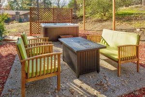 a group of chairs and a table and a grill at Yosemite Corner w NEW game room/Hot Tub/EV & more! in Yosemite Forks +34 photos