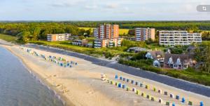 an aerial view of a beach with buildings and condos at Haus Uthlande HAus Uthlande Whg 46 Watten Blick in Wyk auf Föhr