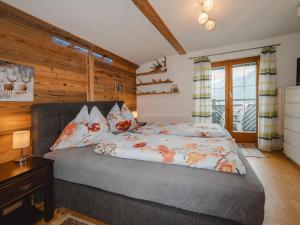 Postel nebo postele na pokoji v ubytování Apartment Dachstein Südwand-2 by Interhome