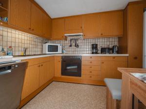 Kuchyň nebo kuchyňský kout v ubytování Apartment Dachstein Südwand-2 by Interhome + 32 fotografií