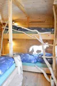 Palanda nebo palandy na pokoji v ubytování Holiday Home Treehouse 1 by Interhome