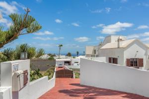 a view of the villa from the balcony of the house at Tea-Rose Loft in Conil
