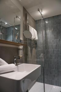 Koupelna v ubytování Dom-Hotel