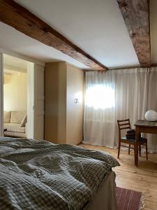Postel nebo postele na pokoji v ubytování Magasinet