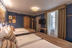 Postel nebo postele na pokoji v ubytování Lady Hamilton Hotel + 37 fotografií