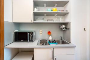 Kuchyň nebo kuchyňský kout v ubytování Ferienwohnung Adrion