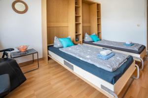 Postel nebo postele na pokoji v ubytování Ferienwohnung Adrion