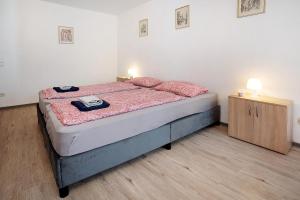 Postel nebo postele na pokoji v ubytování Ferienwohnung Adrion