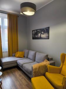 Posezení v ubytování Tabago Studio 32 Brzeg Wolności
