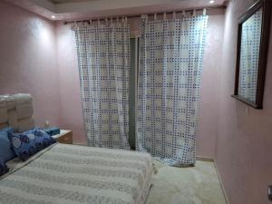 Appartement vue panoramique客房内的一张或多张床位