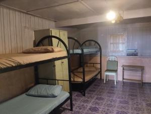 Postel nebo postele na pokoji v ubytování Dorm teriang