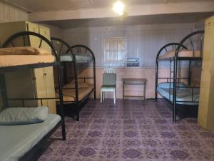 Postel nebo postele na pokoji v ubytování Dorm teriang