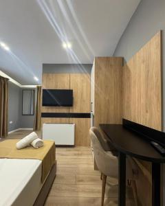 Voodi või voodid majutusasutuse Alko Hotel Bushat toas