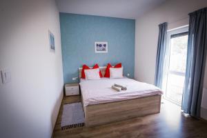 Postel nebo postele na pokoji v ubytování Apartments Relax