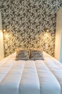Postel nebo postele na pokoji v ubytování L'Ecrin de la Guierle - 1 Chambre